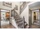 A carpeted staircase with gray banisters leading to the second floor at 1945 Wenlok Ne Trl, Marietta, GA 30066