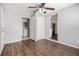 Bedroom featuring wood-look floors, neutral walls, and a ceiling fan for added comfort at 2564 Brentwood Rd, Decatur, GA 30032
