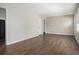Bright living room featuring wood-look floors, neutral walls, and ample space for furniture at 2564 Brentwood Rd, Decatur, GA 30032