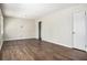 Spacious living room featuring wood-look flooring and neutral paint colors, ready for personalization at 2564 Brentwood Rd, Decatur, GA 30032