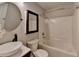 Cozy bathroom featuring a sink, vanity, toilet, and shower with neutral tones at 4960 Markim Forest Ln, Sugar Hill, GA 30518