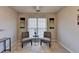 Well-lit bedroom with neutral paint, window, and minimalist decorations at 4960 Markim Forest Ln, Sugar Hill, GA 30518