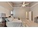 Relaxing bedroom with vaulted ceilings, neutral carpet, and natural light, creating a peaceful atmosphere at 4960 Markim Forest Ln, Sugar Hill, GA 30518