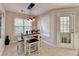 Bright breakfast nook with a view to the rear yard at 4960 Markim Forest Ln, Sugar Hill, GA 30518