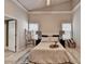 Spacious main bedroom with tray ceiling, carpeting and neutral colored walls at 4960 Markim Forest Ln, Sugar Hill, GA 30518