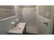 Cozy bathroom featuring modern vanity, mirror, faucet, with tiled shower at 2703 Rainbow Forest Dr, Decatur, GA 30034