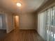 Inviting dining area featuring updated floors and access to a patio at 2703 Rainbow Forest Dr, Decatur, GA 30034