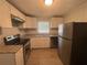 Modern kitchen with stainless steel appliances, granite countertops, and ample cabinet space at 2703 Rainbow Forest Dr, Decatur, GA 30034