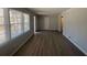 Bright living room with large windows, new floors, and fresh paint at 2703 Rainbow Forest Dr, Decatur, GA 30034