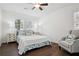 Bright bedroom with hardwood floors, complemented by matching nightstands and love themed decor at 3970 Scott Dr, Forest Park, GA 30297