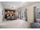 Expansive main bedroom featuring a sitting area, ensuite bathroom, and access to a private balcony at 600 Jardin Ct # 48, Alpharetta, GA 30022