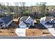 Charming two-story home boasts meticulous landscaping, a two-car garage, and a welcoming entryway at 7545 Rambling Vale, Cumming, GA 30028