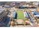 Aerial view of a green space in the city center featuring seating and pedestrian areas, surrounded by buildings at 310 Burgess Walk, Alpharetta, GA 30009