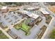 Overhead shot of The Maxwell, showing mini golf, patio space and parking in the surrounding complex at 310 Burgess Walk, Alpharetta, GA 30009
