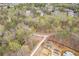An aerial view featuring a beautiful green space with winding trails and sidewalks in a residential area at 310 Burgess Walk, Alpharetta, GA 30009