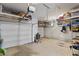 Spacious two car garage with ample storage and a clean, organized layout at 310 Burgess Walk, Alpharetta, GA 30009