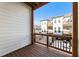 The balcony offers a view of the community, wood floors, and a wood handrail at 520 Clover Ln, Alpharetta, GA 30009