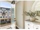 Balcony view shows wood floors, the exterior of the building, and a view of the community at 520 Clover Ln, Alpharetta, GA 30009
