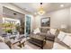 Stylish living room featuring modern decor, and seamless access to the outdoor patio at 520 Clover Ln, Alpharetta, GA 30009
