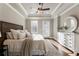 Main bedroom boasting tray ceilings, hardwood floors, and access to balcony at 520 Clover Ln, Alpharetta, GA 30009