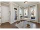 Inviting office area features hardwood floors, natural lighting, and exterior access at 520 Clover Ln, Alpharetta, GA 30009