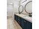 Stylish bathroom with dual sinks, modern fixtures, and plenty of counter space at 5815 P.W.A. Dr, Cumming, GA 30041