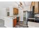 Modern kitchen featuring marble countertops and stainless steel appliances at 5815 P.W.A. Dr, Cumming, GA 30041