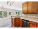 Kitchen featuring marble countertops, stainless steel appliances, and natural light at 5815 P.W.A. Dr, Cumming, GA 30041