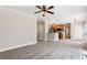 Open living room into kitchen, with pendant lighting at 5815 P.W.A. Dr, Cumming, GA 30041