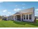Backyard featuring a covered patio and a well-maintained lawn at 67 Narrowleaf Ln, Dallas, GA 30157