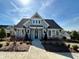 Charming single story home with craftsman-style details and a neatly landscaped front yard on a sunny day at 67 Narrowleaf Ln, Dallas, GA 30157