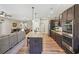 Open-concept kitchen with granite countertops, stainless steel appliances, and seamless flow to living areas at 67 Narrowleaf Ln, Dallas, GA 30157