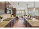 Modern kitchen with granite countertops, stainless steel appliances, and a gas cooktop at 67 Narrowleaf Ln, Dallas, GA 30157