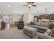 Spacious living room seamlessly connected to kitchen and dining areas, offering comfortable seating and a cozy atmosphere at 67 Narrowleaf Ln, Dallas, GA 30157