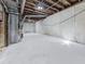 Spacious unfinished basement with exposed beams and concrete walls at 750 Maggie Nw Ct, Kennesaw, GA 30144