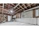 Unfinished basement space with exposed ceiling beams and concrete foundation at 750 Maggie Nw Ct, Kennesaw, GA 30144