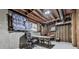 Unfinished basement with exposed beams and concrete walls ready to be finished for extra living space at 750 Maggie Nw Ct, Kennesaw, GA 30144