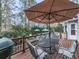 Outdoor wooden deck area with ample seating and dining space at 750 Maggie Nw Ct, Kennesaw, GA 30144
