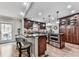Spacious kitchen with granite countertops, stainless steel appliances, and a breakfast bar for casual dining at 750 Maggie Nw Ct, Kennesaw, GA 30144