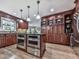Gourmet kitchen with an island, stainless appliances, and plenty of cabinet space at 750 Maggie Nw Ct, Kennesaw, GA 30144