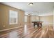 Finished basement area with hardwood flooring, ceiling light and window at 802 Eagle Glen Xing, Woodstock, GA 30189