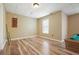 Finished basement area with hardwood floors, window and pool table at 802 Eagle Glen Xing, Woodstock, GA 30189