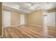 Spacious finished basement with hardwood floors, neutral paint and recessed lighting at 802 Eagle Glen Xing, Woodstock, GA 30189