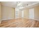 Finished basement offers hardwood floors, built in shelves and storage at 802 Eagle Glen Xing, Woodstock, GA 30189