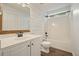 Updated bathroom featuring a modern vanity, shiplap walls, and a shower-tub combination at 802 Eagle Glen Xing, Woodstock, GA 30189