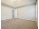 Comfortable bedroom with neutral paint, tray ceiling, and recessed lighting at 802 Eagle Glen Xing, Woodstock, GA 30189