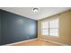 Bedroom with hardwood floors and natural light, perfect for relaxation at 802 Eagle Glen Xing, Woodstock, GA 30189