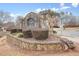 Welcome to Eagle Glen, a beautiful community featuring mature landscaping and inviting homes at 802 Eagle Glen Xing, Woodstock, GA 30189