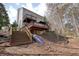 Multi-level deck with stairs and a slide leading to the yard offering outdoor enjoyment and entertainment possibilities at 802 Eagle Glen Xing, Woodstock, GA 30189
