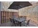 Spacious deck featuring table, chairs and a large umbrella at 802 Eagle Glen Xing, Woodstock, GA 30189